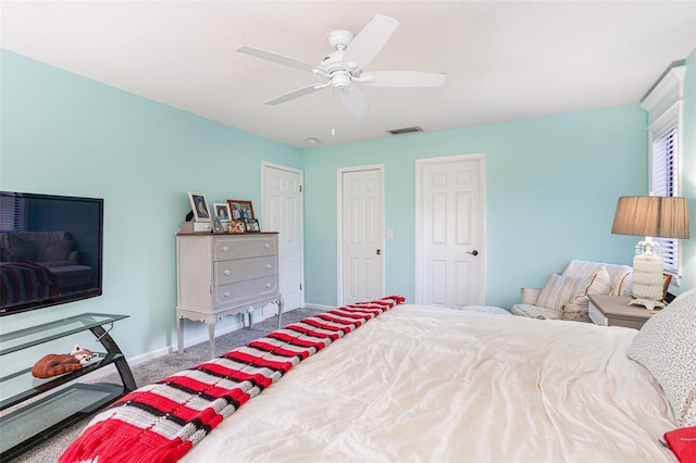 carpeted bedroom with ceiling fan