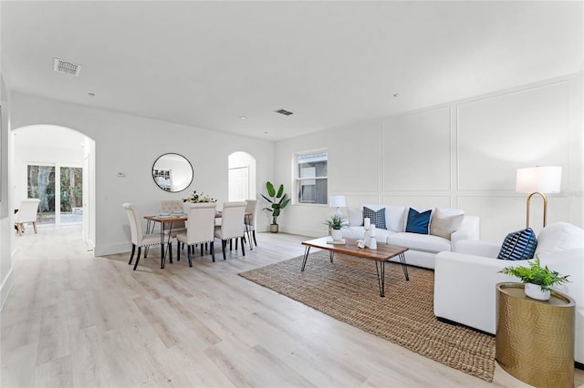 living room with light wood-type flooring