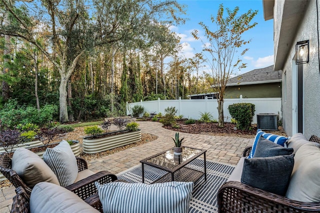 view of patio / terrace featuring an outdoor hangout area and central air condition unit