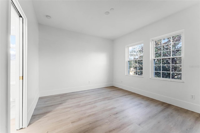 empty room featuring light hardwood / wood-style floors