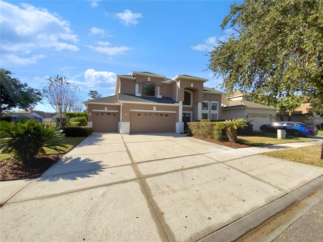 view of front of home with a garage