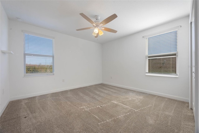 unfurnished room with carpet floors and ceiling fan