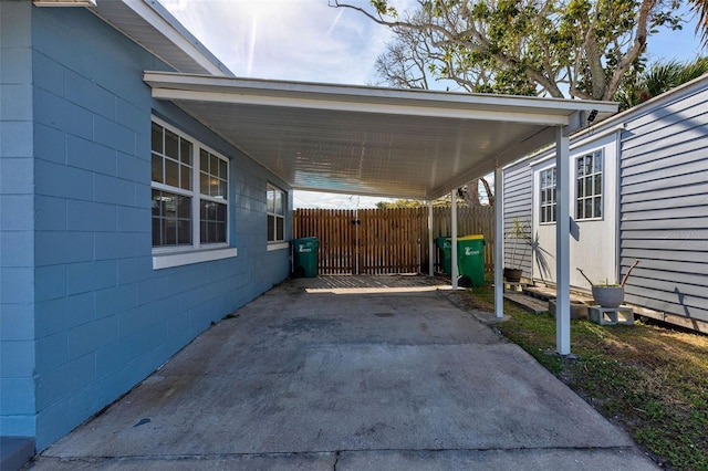 view of parking / parking lot with a carport