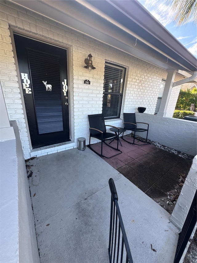 entrance to property with a porch