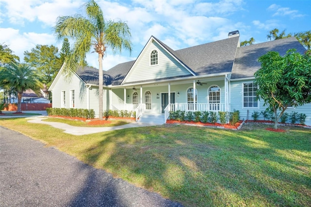 view of front of property featuring a porch and a front lawn