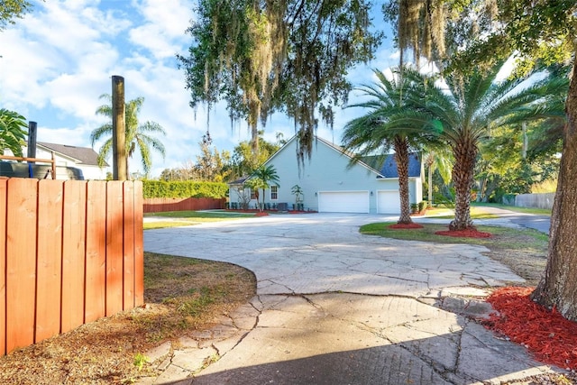 view of side of property featuring a garage