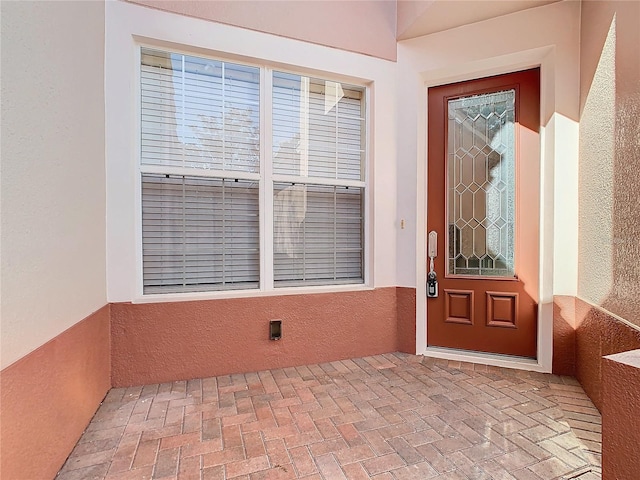 1300 Gilford Point Ln Unit 1300, Davenport, FL 33896 - view of exterior entry featuring stucco siding