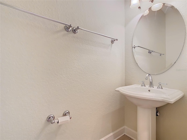 1300 Gilford Point Ln Unit 1300, Davenport, FL 33896 - bathroom with baseboards