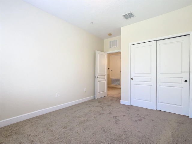 1300 Gilford Point Ln Unit 1300, Davenport, FL 33896 - unfurnished bedroom with carpet and a closet