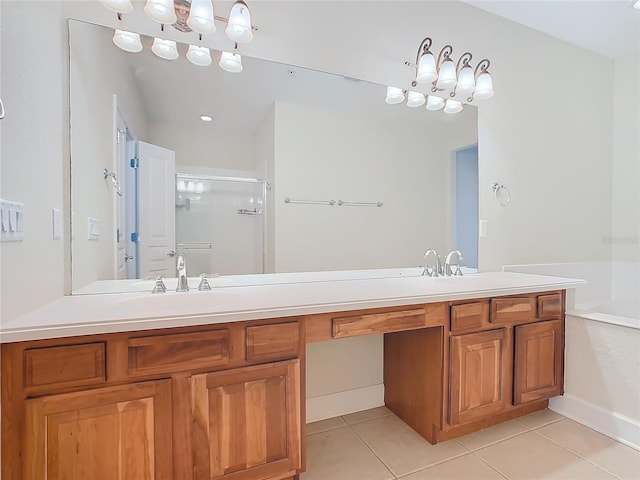 bathroom with tile patterned floors, separate shower and tub, and vanity