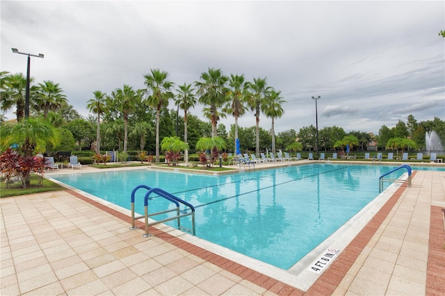 view of pool featuring a patio