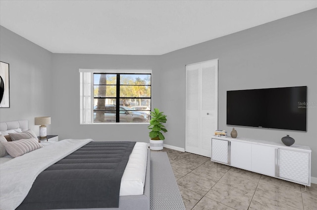 bedroom with light tile patterned flooring