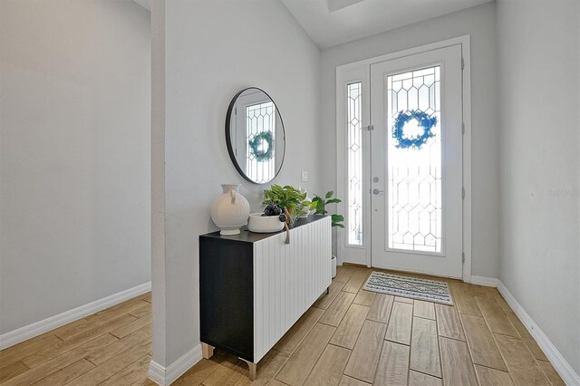 3359 Hanging Tide St, Winter Garden, FL 34787 - foyer with light wood-style flooring and healthy amount of natural light