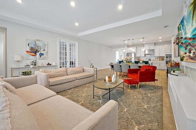 3359 Hanging Tide St, Winter Garden, FL 34787 - living area featuring recessed lighting and a raised ceiling
