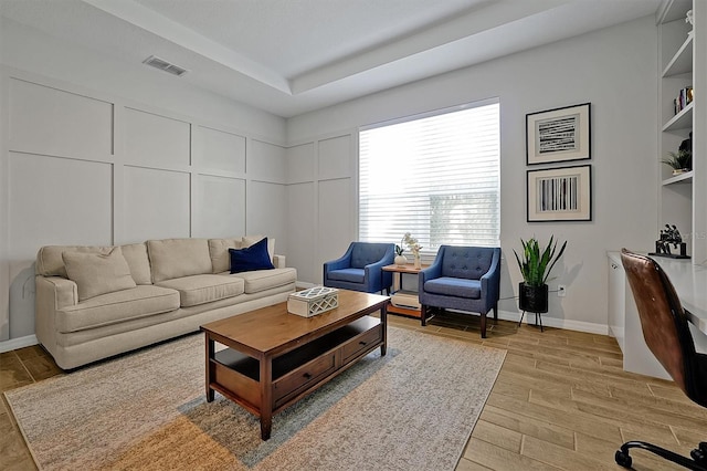 3359 Hanging Tide St, Winter Garden, FL 34787 - living area with light wood-type flooring and baseboards