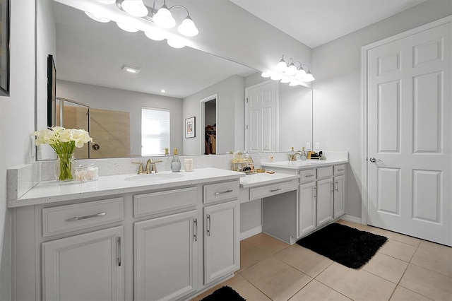 3359 Hanging Tide St, Winter Garden, FL 34787 - full bath featuring double vanity, tile patterned flooring, and tiled shower