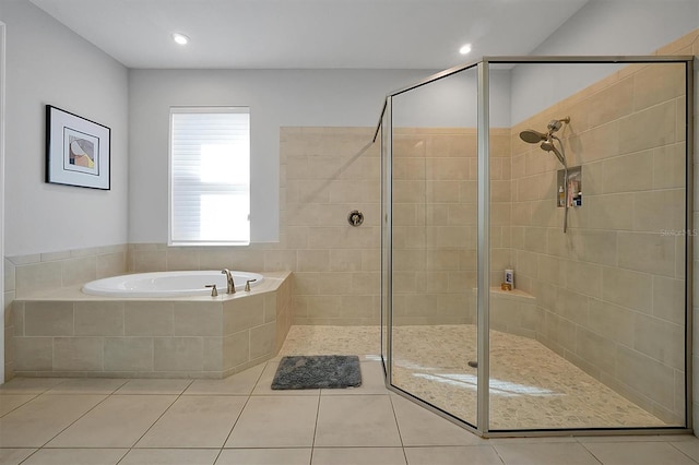3359 Hanging Tide St, Winter Garden, FL 34787 - full bathroom with a garden tub, a stall shower, and tile patterned flooring
