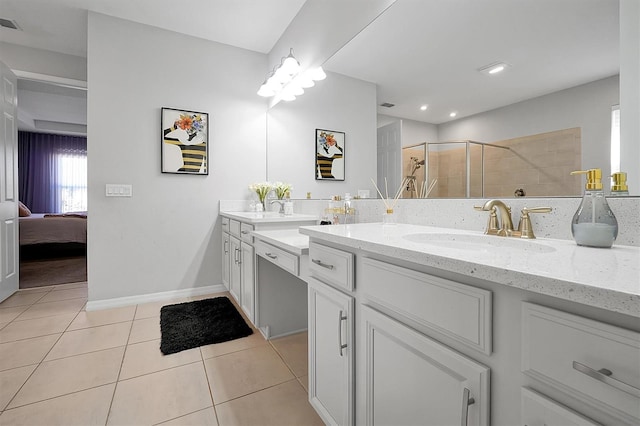 3359 Hanging Tide St, Winter Garden, FL 34787 - full bathroom featuring double vanity, a stall shower, tile patterned flooring, connected bathroom, and recessed lighting