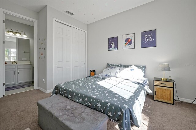 3359 Hanging Tide St, Winter Garden, FL 34787 - carpeted bedroom featuring a closet and ensuite bath