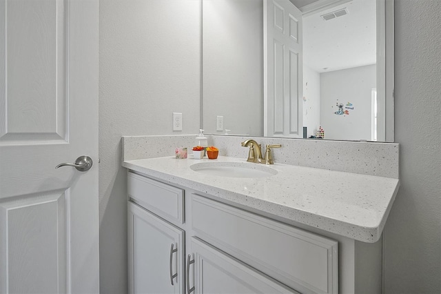 3359 Hanging Tide St, Winter Garden, FL 34787 - bathroom featuring vanity and a textured wall
