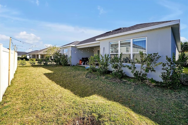 3359 Hanging Tide St, Winter Garden, FL 34787 - rear view of property with stucco siding