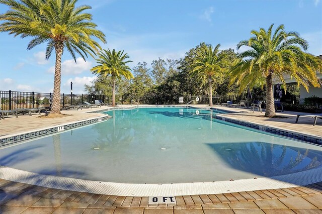 3359 Hanging Tide St, Winter Garden, FL 34787 - community pool with a patio area
