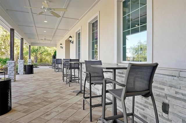 3359 Hanging Tide St, Winter Garden, FL 34787 - view of patio with a ceiling fan and a bar