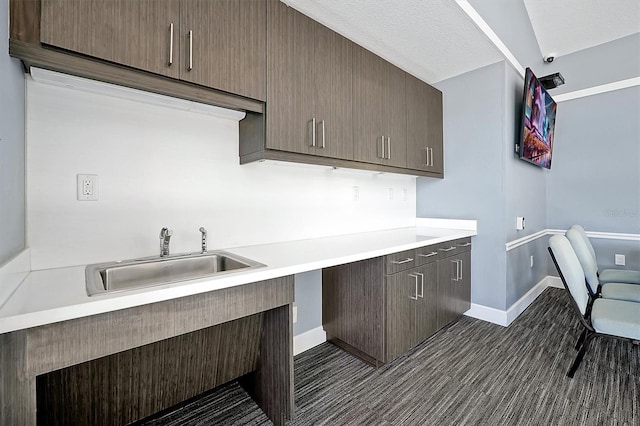 3359 Hanging Tide St, Winter Garden, FL 34787 - kitchen with light countertops and dark wood-style flooring