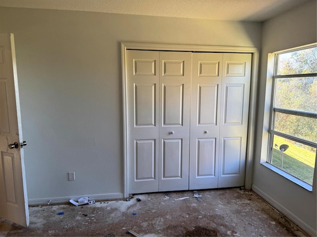 unfurnished bedroom featuring a closet