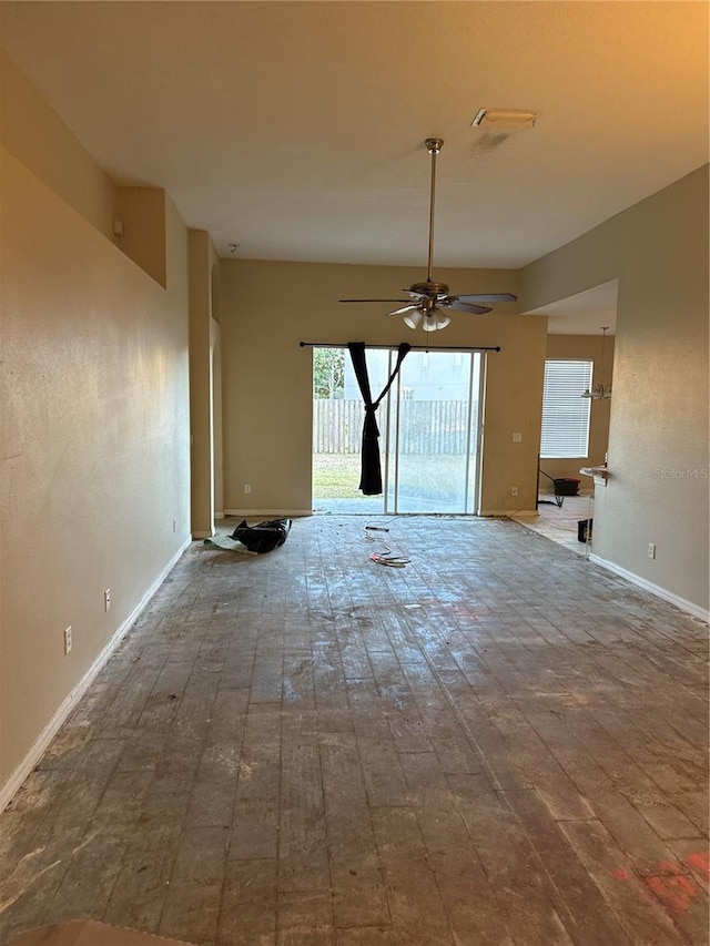 spare room featuring ceiling fan and wood-type flooring