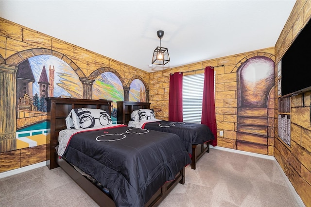 carpeted bedroom featuring wooden walls