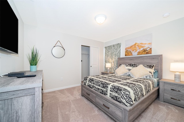 carpeted bedroom featuring a closet