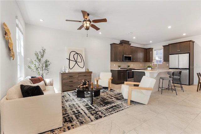 2097 Celebration Blvd, Celebration, FL 34747 - living area with ceiling fan and recessed lighting