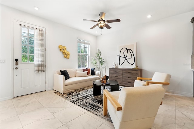 2097 Celebration Blvd, Celebration, FL 34747 - living area with a ceiling fan, light marble finish flooring, and recessed lighting