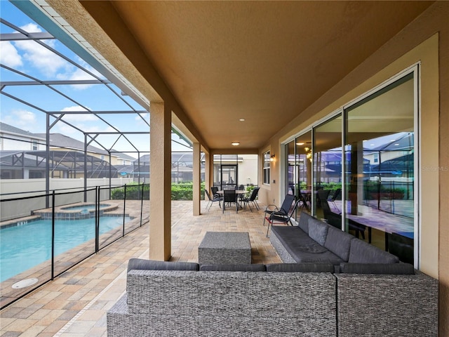 view of patio / terrace with an outdoor hangout area, glass enclosure, and a pool with hot tub