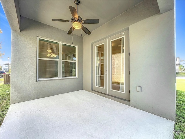 view of patio with ceiling fan and french doors