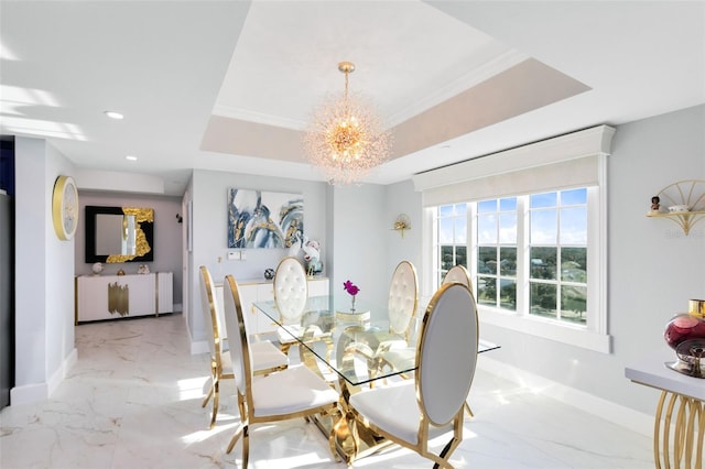 dining space featuring a raised ceiling, ornamental molding, and an inviting chandelier