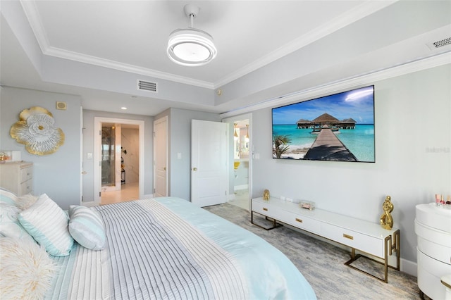 bedroom with ensuite bath and crown molding