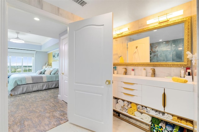 bathroom with vanity and walk in shower