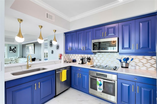 kitchen featuring kitchen peninsula, stainless steel appliances, hanging light fixtures, and sink