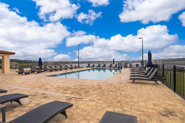 view of pool featuring a patio area