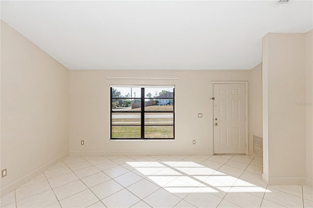 view of tiled spare room