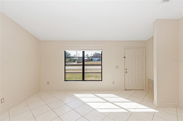 1073 Humphrey Blvd, Deltona, FL 32738 - spare room featuring light tile patterned flooring and baseboards
