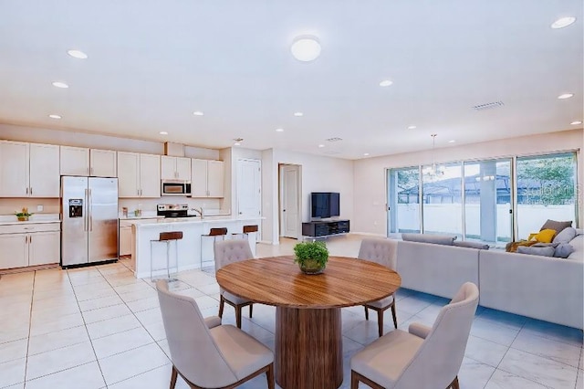 view of tiled dining space