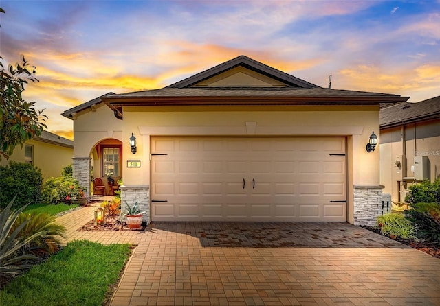 view of front of property featuring a garage