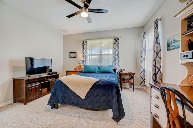 bedroom with light carpet and ceiling fan