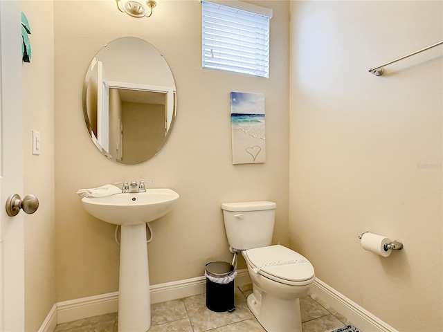 5303 Wildwood Way, Davenport, FL 33837 - half bathroom featuring toilet and tile patterned floors