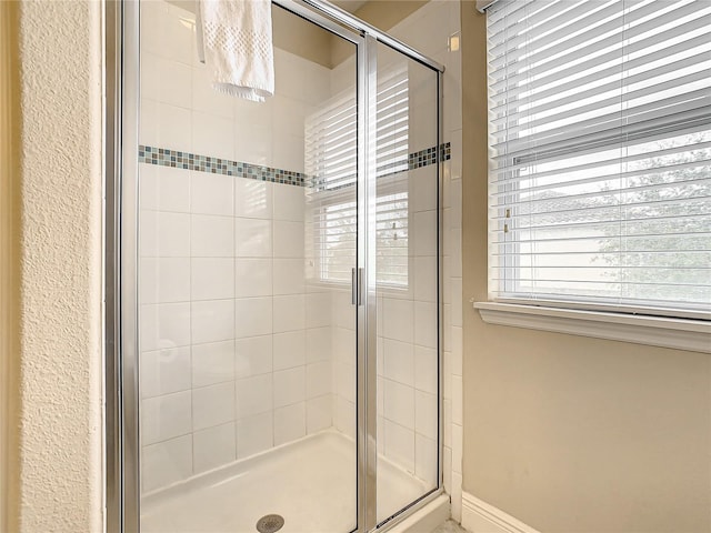 bathroom featuring walk in shower