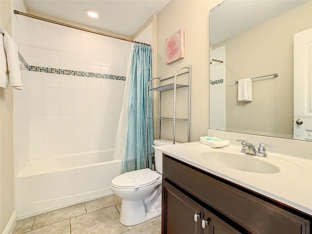 full bathroom with tile patterned floors, vanity, shower / bath combo, and toilet