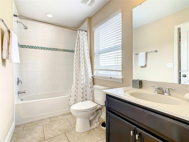 full bathroom featuring tile patterned flooring, vanity, toilet, and shower / bathtub combination with curtain